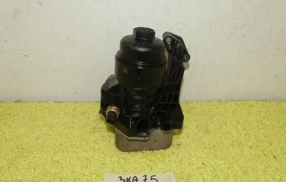 Volkswagen Golf VII Oil filter mounting bracket 03N115389 03N117021