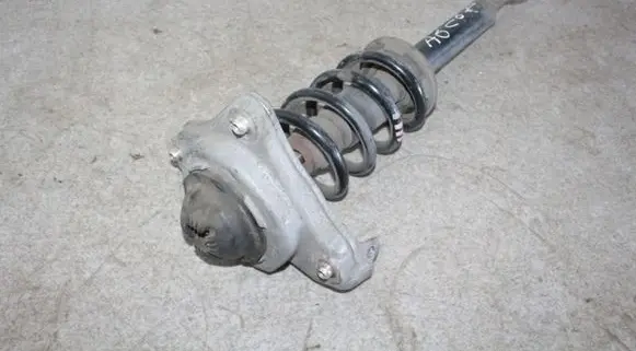 Audi A6 S6 C6 4F Front shock absorber with coil spring