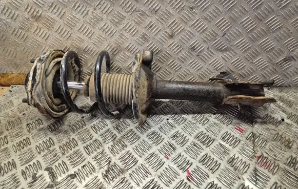 Nissan X-Trail T30 Front shock absorber with coil spring 