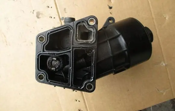 Volkswagen Polo V 6R Oil filter mounting bracket 03L117021C