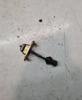 Subaru Outback Front door check strap stopper 