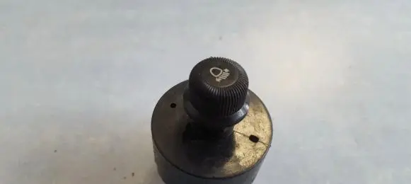 Mitsubishi Colt Headlight level height control switch
