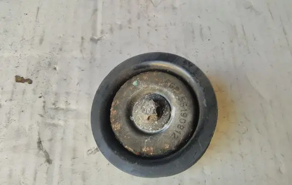 Opel Zafira B Belt tensioner pulley 55190812