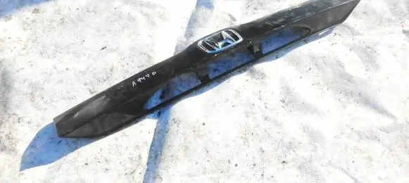 Trunk door license plate light bar