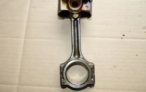 Piston with connecting rod