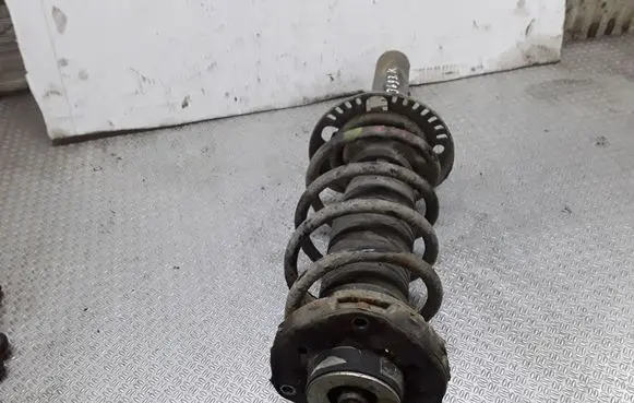 Volkswagen Polo IV 9N3 Front shock absorber with coil spring