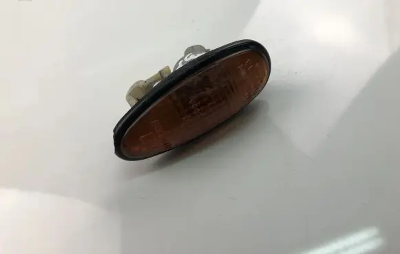 Mazda 121 Front fender indicator light