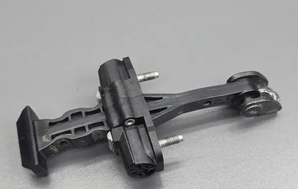 Ford Fiesta Front door check strap stopper AV11R23500AA