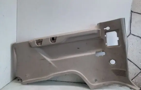 Trunk/boot lower side trim panel