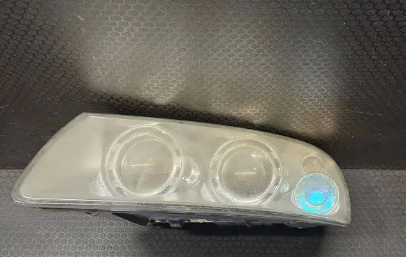 Volkswagen Touareg I Headlight/headlamp 7L6941015 7L6941015BK