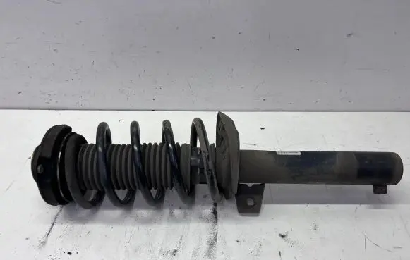 Volkswagen PASSAT B8 USA Front shock absorber/damper 561413031K