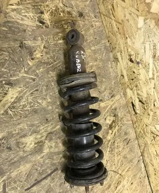Nissan Pathfinder R50 Front shock absorber with coil spring