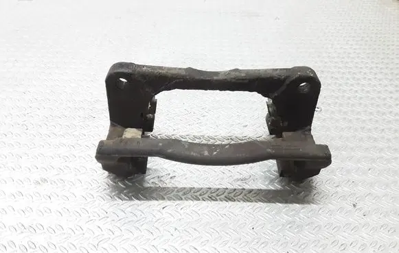 Suzuki Swift I Front Brake Caliper Pad/Carrier 