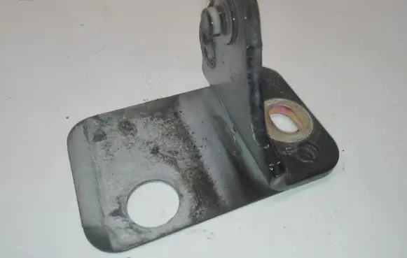Front door lower hinge