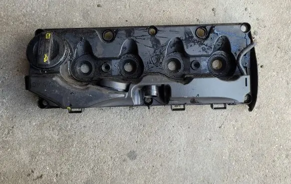 Rocker cam cover