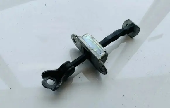 Nissan Note (E11) Rear door check strap stopper
