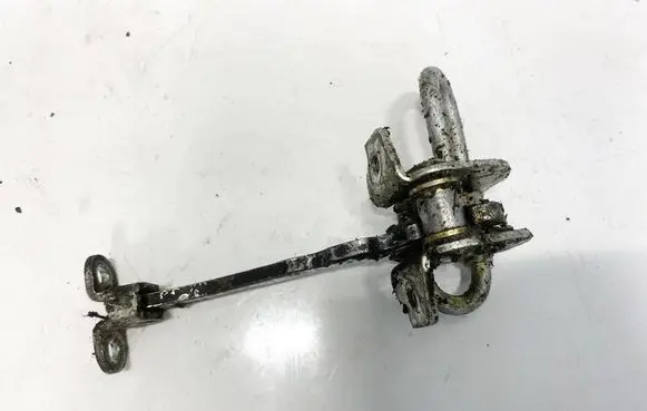 Front door check strap stopper