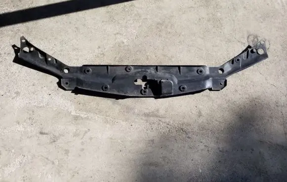 Engine bonnet/hood lock trim molding