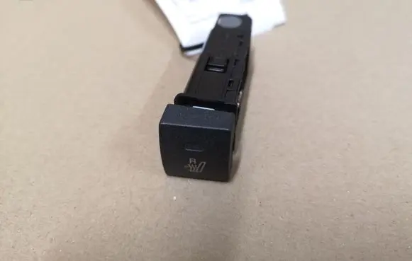 Seat heating switch
