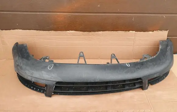 Volkswagen Touran I Front bumper lip 1T0805903A