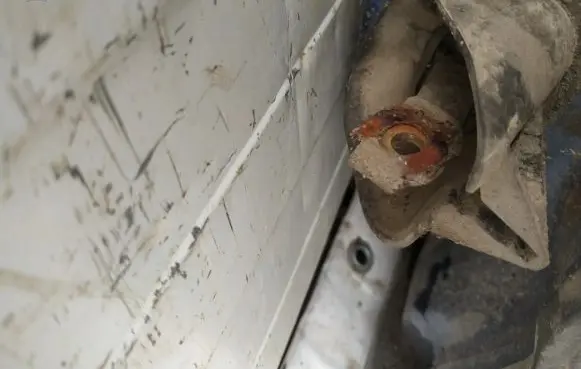 Rear door check strap stopper