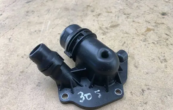 Thermostat/thermostat housing