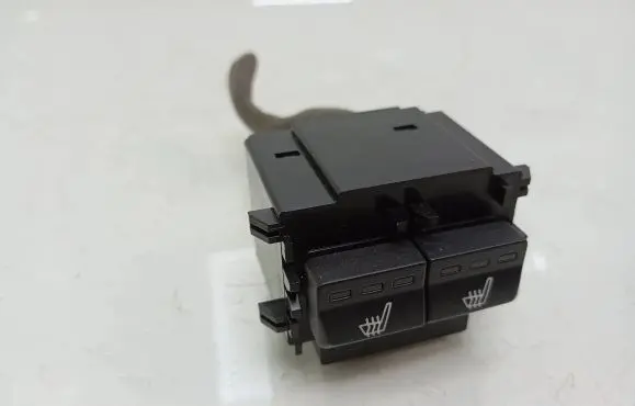 Seat heating switch