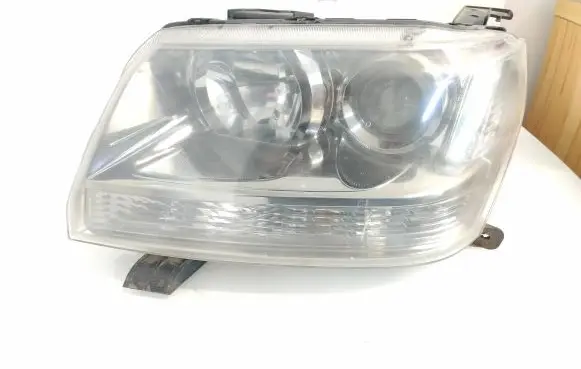 Suzuki Grand Vitara II Headlight/headlamp 10059083