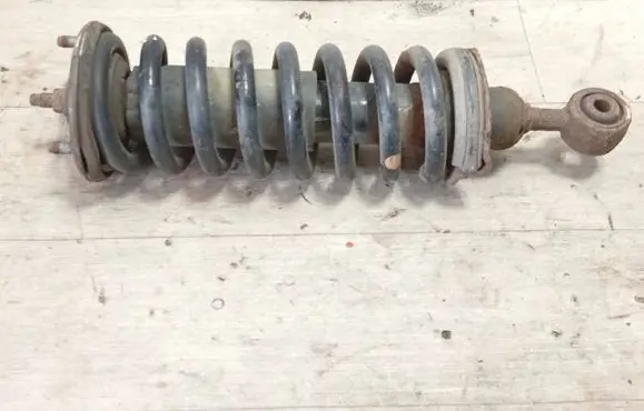 Front shock absorber with coil spring