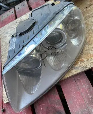 Volkswagen Touareg I Headlight/headlamp 7L6941015BL 89308471