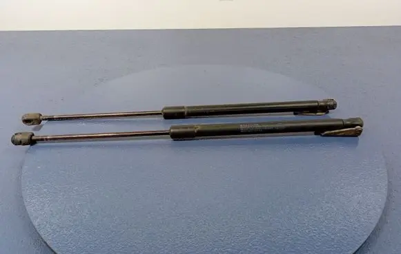 Nissan Micra Shock absorber/damper mounting bracket 90450AX60B