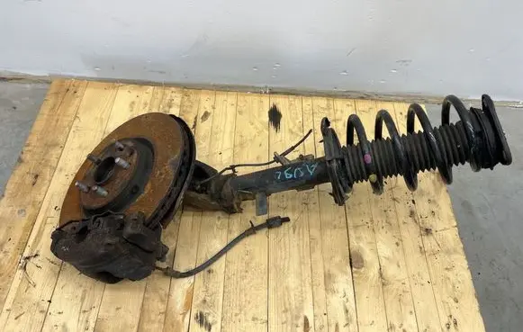 Front shock absorber with coil spring
