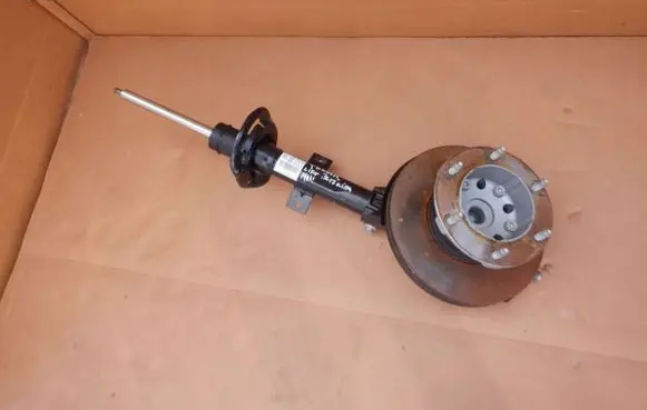 Front wheel hub spindle knuckle