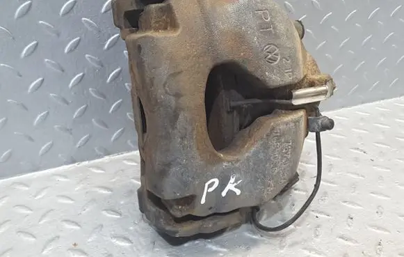 Volkswagen Touareg I Front brake caliper 7L6105D