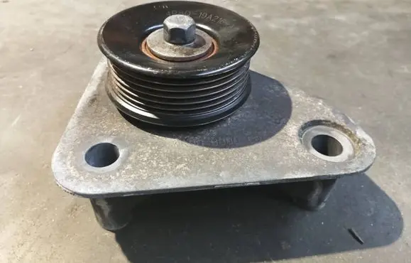 Jaguar XF X250 Belt tensioner pulley 4R8Q19A216AC
