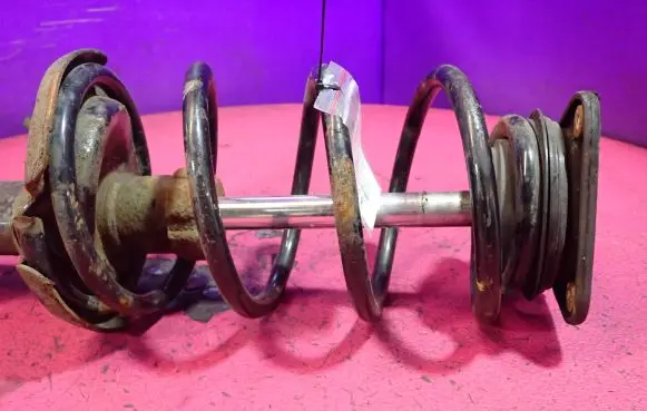 Front shock absorber with coil spring
