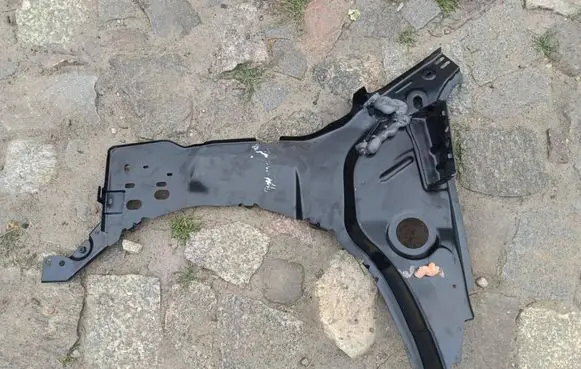 Opel Corsa F Fender mounting bracket 52197161 12013248 0052197161
