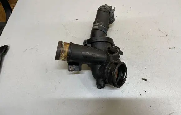Thermostat/thermostat housing