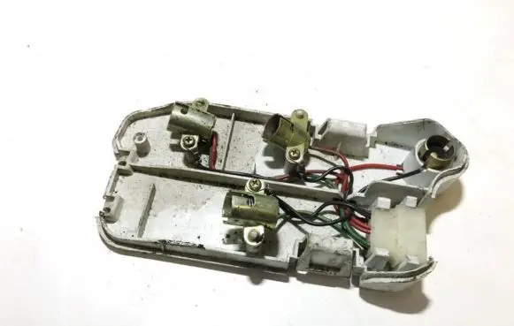 Tail light bulb cover holder