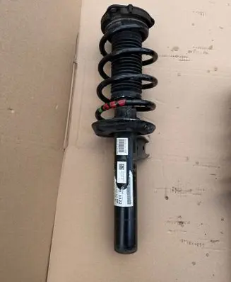 Volkswagen Tiguan Front shock absorber with coil spring 5N0413031AM 5N0412021FP 231112C1238
