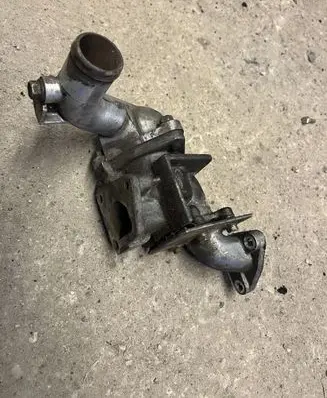 Thermostat/thermostat housing