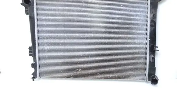 KIA Carens III Coolant radiator 25310A4050