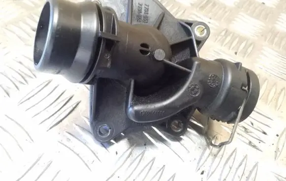 Thermostat/thermostat housing