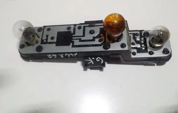 Nissan Almera N16 Tail light bulb cover holder 236873