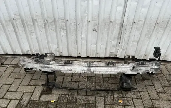 Radiator support slam panel