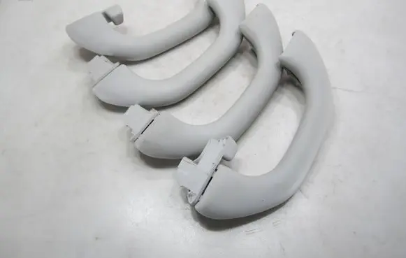 Volkswagen Golf V A set of handles for the ceiling 1K0857607J