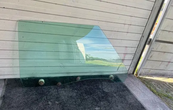 Cadillac DeVille Front door window/glass (coupe) 