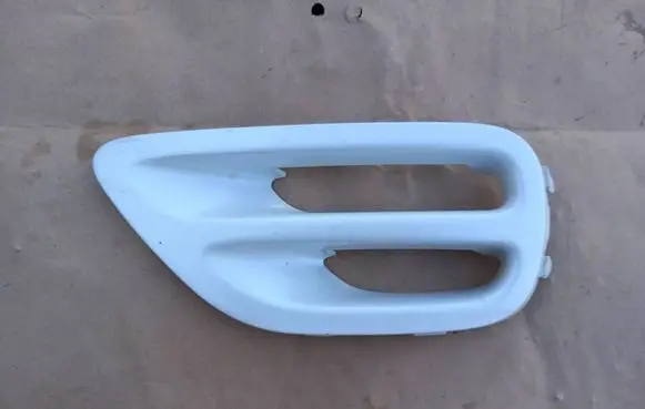 Subaru Legacy Front bumper lower grill 57731AG030