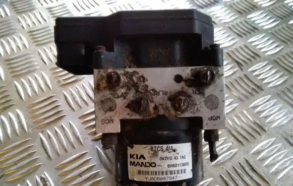 KIA Carens I ABS Pump 0K2FD437A0 5WY7207B BH60113600