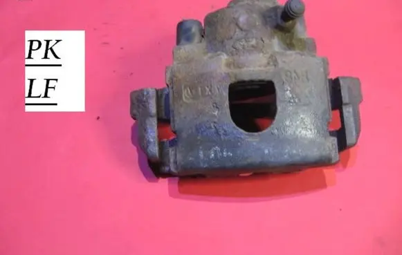 Ford Courier Front brake caliper 8487X1